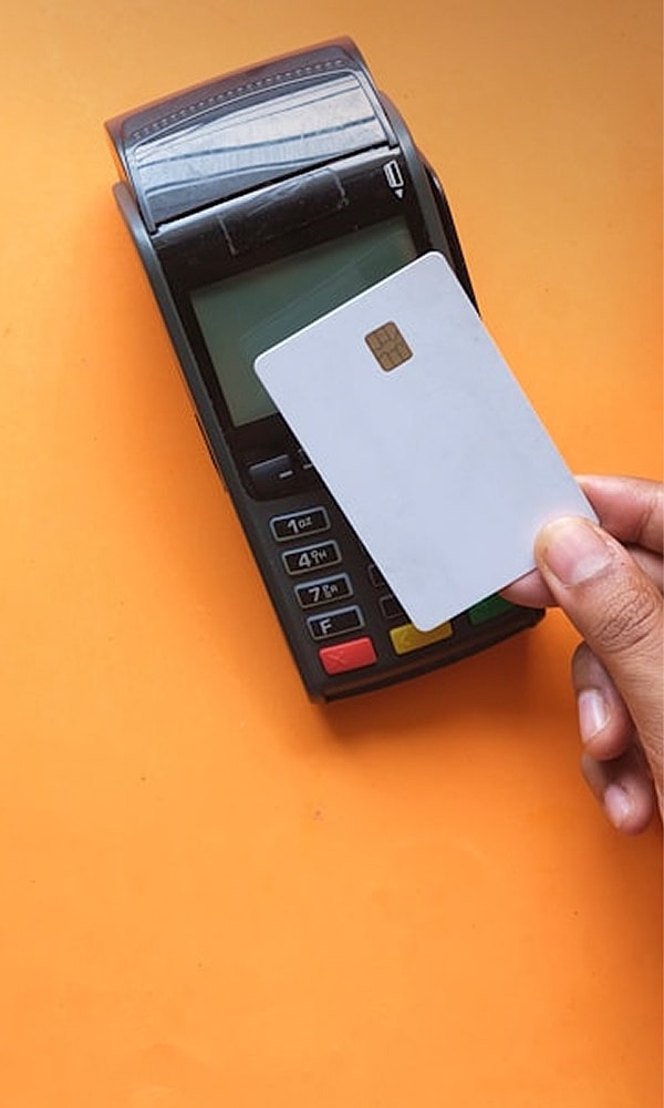 Using card on a payment terminal.