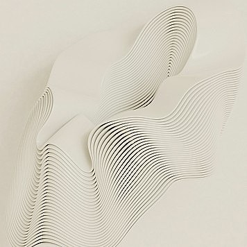 Abstract white sculpture with wavy lines.
